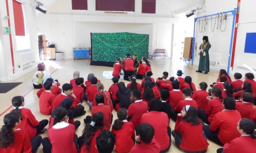 Year 6 watching the Young Shakespeare Company.